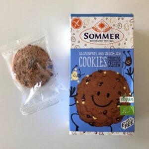 the vegan choco cookie with cashews in a non-plastic wrap outside the package